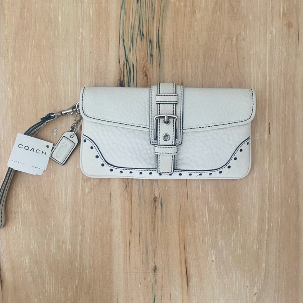Coach Cream Wristlet with Buckle Detail in excellent condition